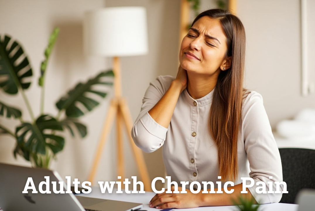 Person with back pain at desk